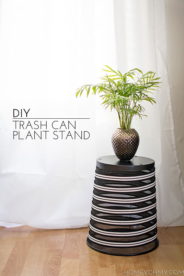 Decorate a boring trash can and repurpose it into a plant stand.  Click through for the tutorial!