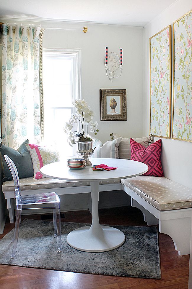 Tulip table with banquette seating