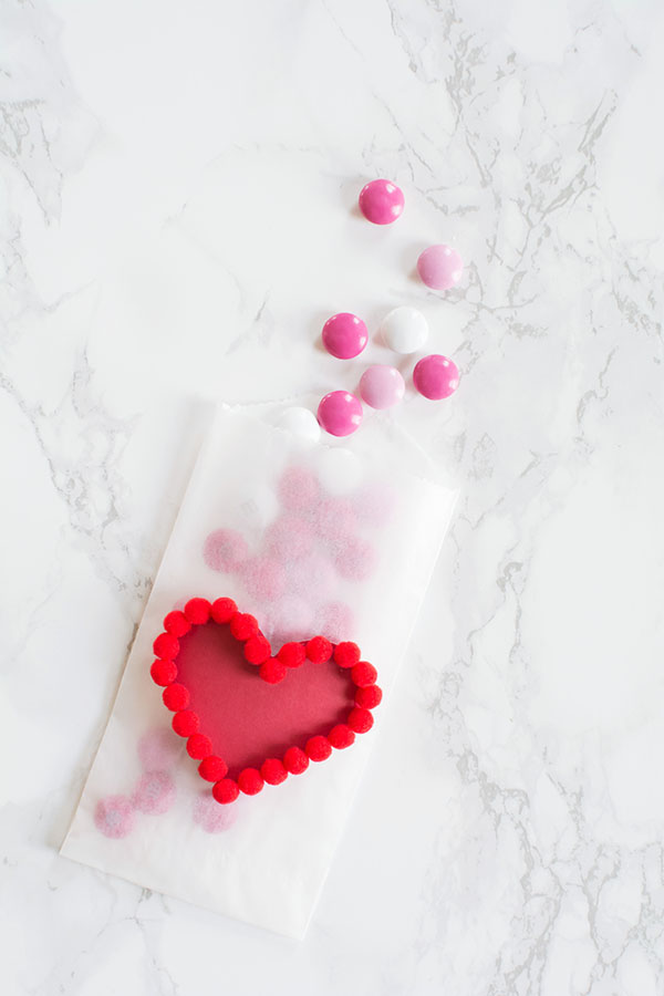 DIY pom pom heart treat bag