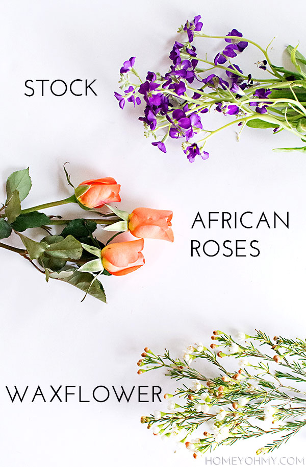 Stock, African roses, and waxflower