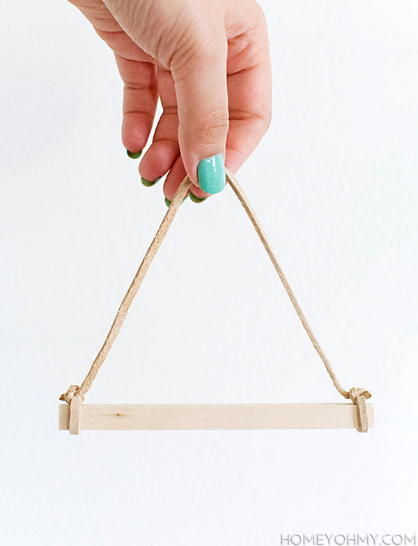 Wood and suede hanger